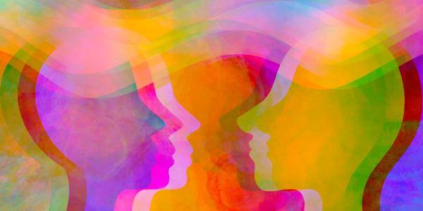 colorful silhouettes of two people facing each other as if illuminated from different angles by different colored lights