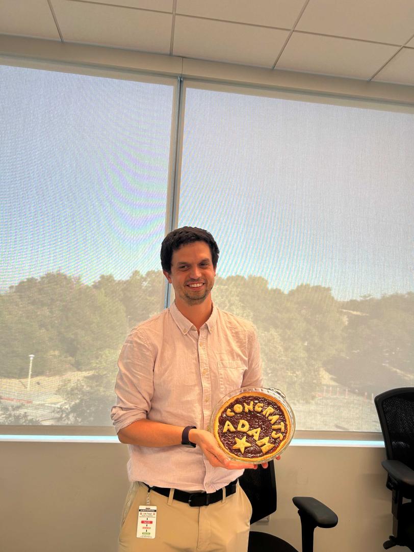 dr. Adam Nielander celebrating the Early Career Award