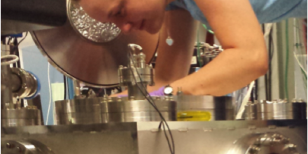 Anna working on a vacuum chamber