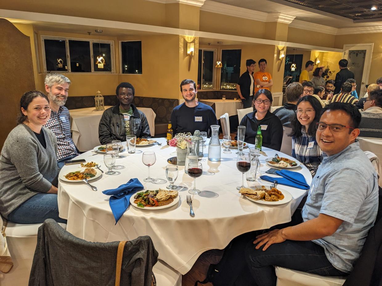 Research group photo during dinner